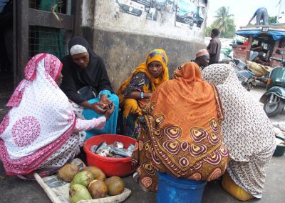 Vente poisson et noix de coco marché Stone Town Zanzibar Tanzanie
